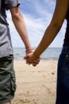Hands Across the Sand link activists