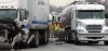 Semi crash spills fuel, snarls traffic