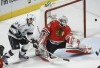 Blackhawks goalie Corey Crawford defects a shot by Los Angeles center Colin Fraser during the second period in Game 1 of the Western Conference finals Saturday.