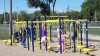 Parents install new playground equipment at Lake Village