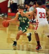 Valparaiso's Brody Wilson drives past Portage's Jordan Simpson