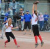 Portage pitcher Kiley Jones jumps into the air with excitement while first baseman Stephanie Upton runs over to help celebrate the Indians' Class 4A state championship Saturday night.