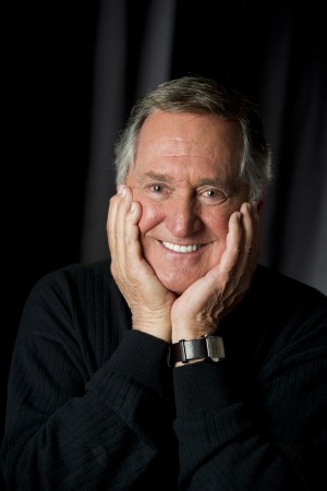 Neil Sedaka turns his calendar girl into dino pet