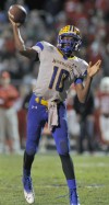 Crete Monee quarterback Marcus Terrell passes against Ottawa on Saturday night.
