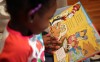 Some region parents prefer real books to tech devices for youngsters