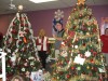 Women brighten the holiday for needy families while staying fit