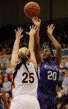 Merrillville's Jaz Tailey shoots from the perimeter against Warsaw on Saturday night.