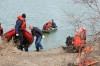Dive team searches pond for clues in missing doctor case
