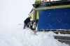 Snow plows work to clear the snow