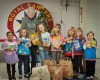 Lansing Girl Scouts collect food for needy