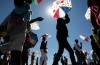 Students parade through University Park neighborhood for peace