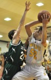 Kouts' Matt Stewart looks for an open shot