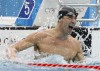 Phelps wins 7th gold by 0.01 seconds