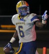 Crete Monee's LaQuon Treadwell signals towards the crowd 