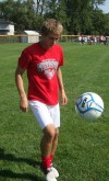 Drake Bowers, Munster, dribbles soccer ball