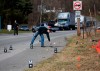 Man marking underground utilities struck by car  