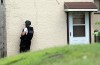Police: Woman, baby held during stand-off
