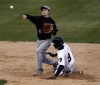 Bishop Noll's Danny Pobereyko gets forced at second by Lowell's Reed Holdeman during the 11th Annual High School Challenge.