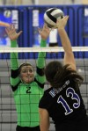 Lake Central's Katherine Stepanian puts a shot past Valparaiso's Kelsie Schutz 