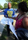 Supporters rally for former D.205 principals