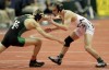 Griffith's Orzechowicz wins one for suspended teammate