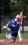 Lake Central's Chuck Alexa tries to break up a double play by Portage's Patrick Derr on Friday.