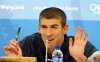 Phelps wins 7th gold by 0.01 seconds