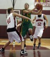 Morgan Twp's Jaron Coleman rolls up to shoot while Washington Twp's Zac Cannon(cq), left, defends