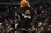 Bulls rally late without Rose to bump off Boston