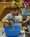 Young chefs whip up biscuits to aid Portage pantry for needy pets
