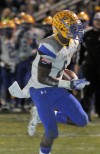 Crete Monee's LaQuon Treadwell runs for a first-half touchdown