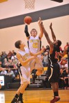 Kouts' Max Everaert shoots against Gary 21st Century on Wednesday.