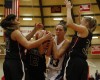 Lake Central's Jessica Bell gets surrounded by three Lowell defenders