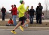 Spectators watch runners in the Ringing in Spring 5K race in Valparaiso.