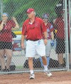 Hanover Central head coach Larry McMillian watches his player at the plate Tuesday night during the Class 3A regional championship against Griffith.