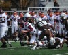 Mt. Carmel defenders Enoch Smith, left, Vincent Speller
