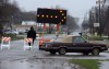 Flooded roads, swollen rivers, lightning strikes as storms sock region