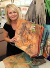Walgreens program showcases artist's paintings on tote bags