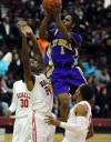 T.F. North's Deandre Lowery shoots over 