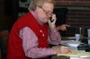 George Van Til works the phones and tallies numbers