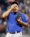 Burrell's sacrifice fly in 11th lifts Giants over Cubs