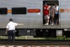 South Shore train hits car