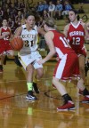 Kouts' Jayla Crump is guarded by Hebron's Bre Lewin