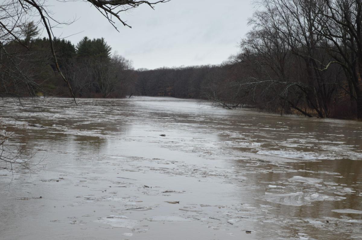 Rising waterways and localized flooding reported in area (w/ photo