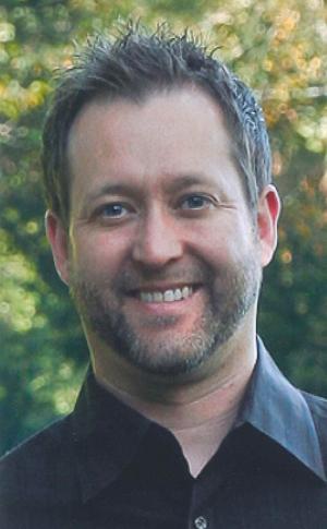 Aaron M. Kolls