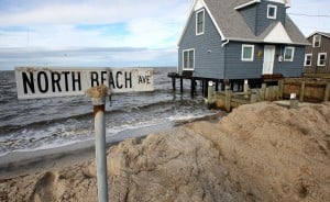  : Damaged homes on North Beach Ave on the Delaware Bay in Reeds Beach, Middle Township. Residents of Cape May County deal with the clean-up in the wake of Hurricane Sandy. Wednesday Oct. 31, 2012. (Dale Gerhard/Press of Atlantic City)
 - Photo by Dale Gerhard