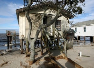  : Damaged homes on North Beach Ave on the Delaware Bay in Reeds Beach, Middle Township. Residents of Cape May County deal with the clean-up in the wake of Hurricane Sandy. Wednesday Oct. 31, 2012. (Dale Gerhard/Press of Atlantic City)
 - Photo by Dale Gerhard