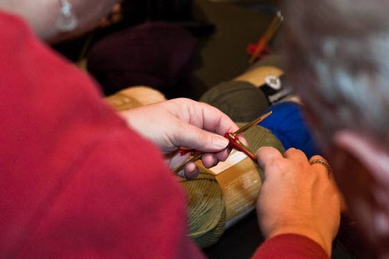 Scarf It Up pairs friendly get-together with program of knitting for charity