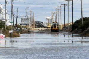  : Ocean Drive in Sea Isle City was still impassable from 13th Street north. Residents of Cape May County deal with the clean-up in the wake of Hurricane Sandy. Wednesday Oct. 31, 2012. (Dale Gerhard/Press of Atlantic City)
 - Photo by Dale Gerhard