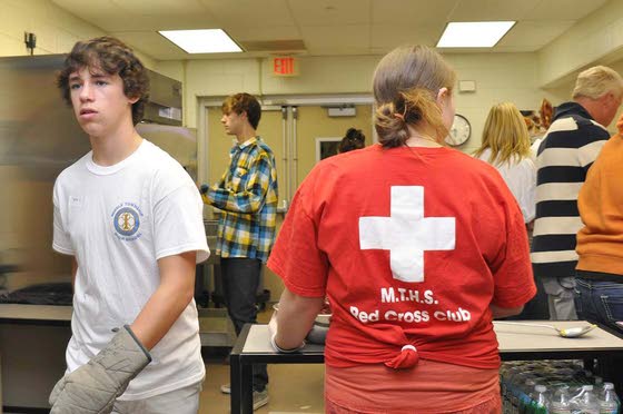 Three MTHS clubs join to stage dinner for Caring for Kids clients